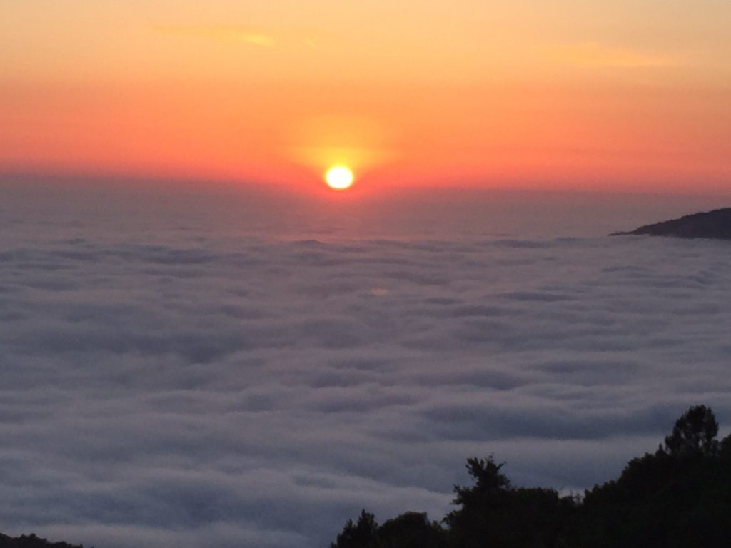 Camping Sunset Over Clouds Image