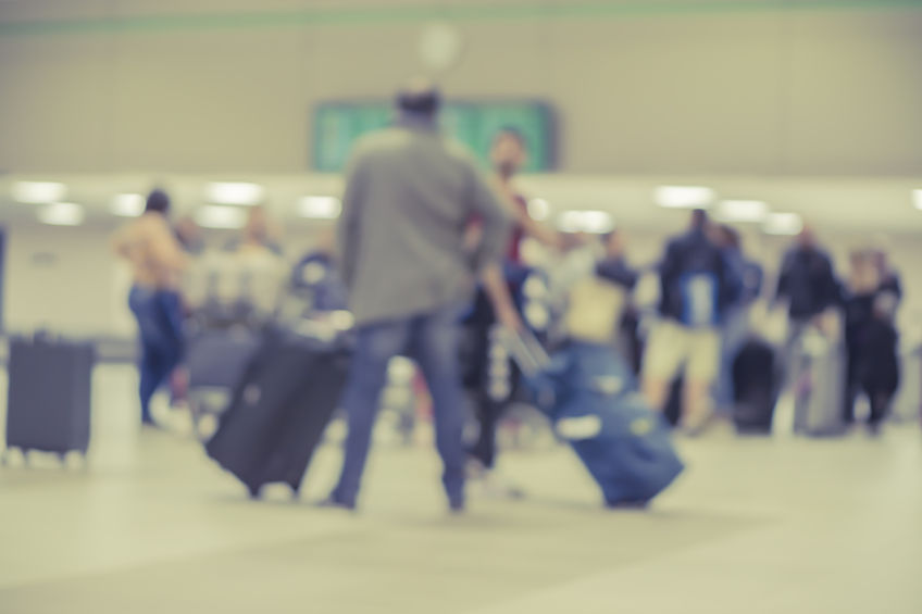 Blurred Background of People Walking in the Airport Image